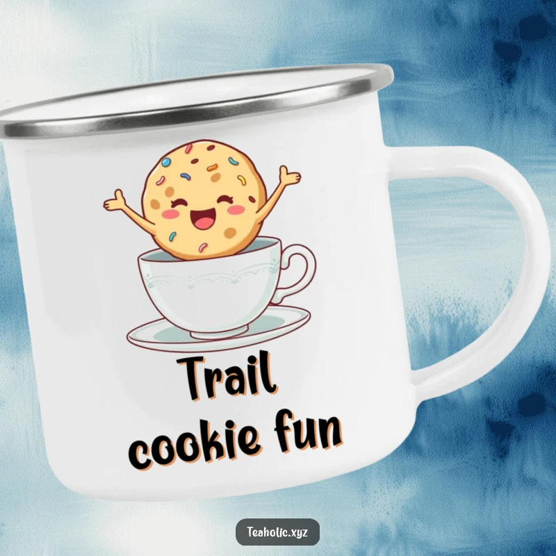 Funny enamel camping mug with a delighted cookie with sprinkles jumping excitedly in a teacup, outdoor-ready.