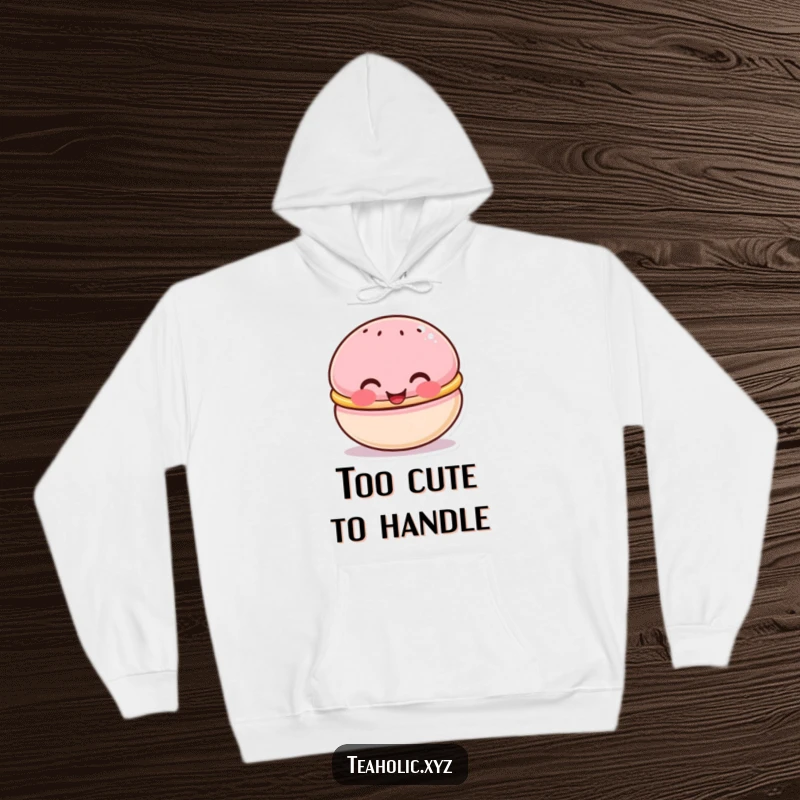 Funny hoodie with a cute macaron character sporting rosy cheeks, beaming happily, perfect for cozy, sweet comfort.