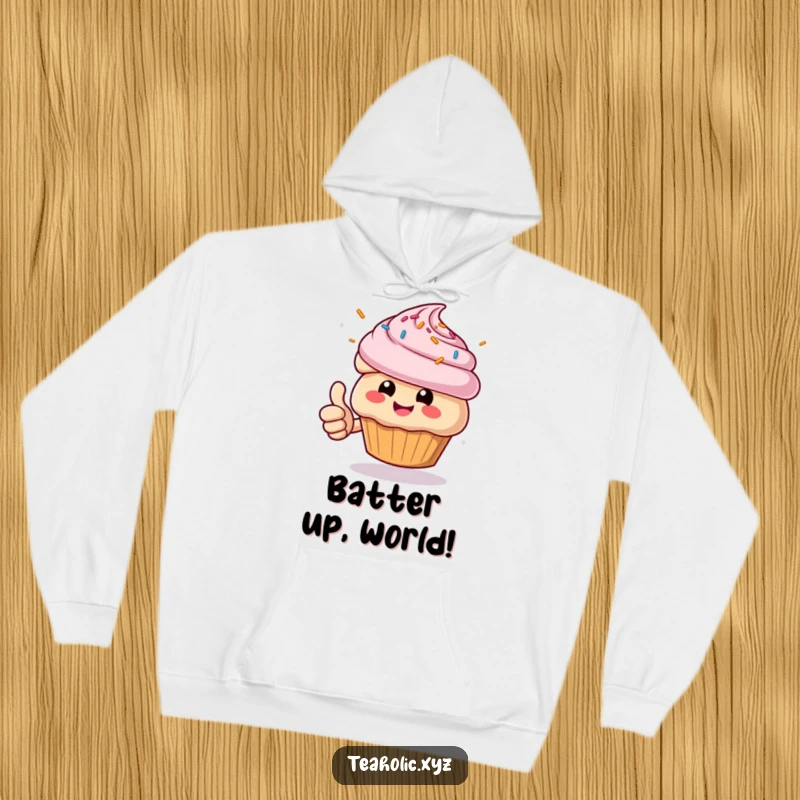 Funny Muffin Hoodie: Cheerful character giving a thumbs up with sprinkles flying, cozy and humorous apparel.