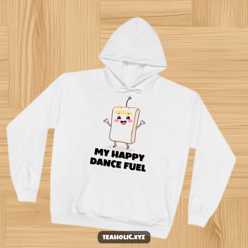 Funny smiling teabag character doing a lively jig on a warm, snuggly hoodie.
