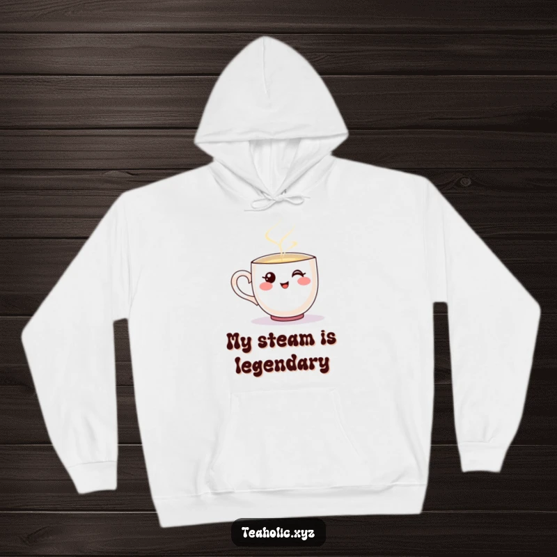 Funny hoodie featuring a smiling teacup character pouring a steaming stream of liquid.
