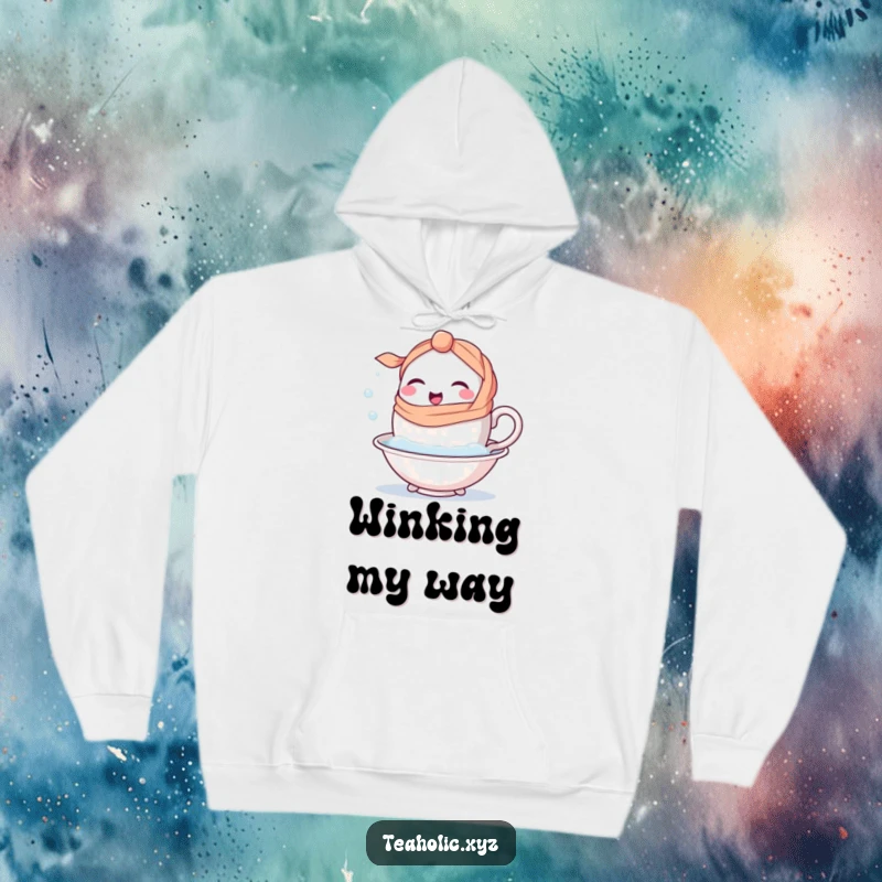 Funny happy teacup character wearing a handle-scarf, winking as it dips into a bubbly bath on a cozy hoodie.