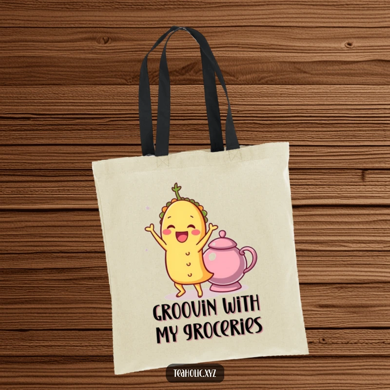 Funny taco character doing a delightful shimmy next to a teapot, printed on a practical and humorous tote bag.